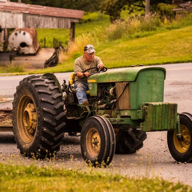 tractor pulling a plow